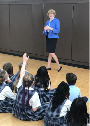 Author Nancy Larson speaks to students